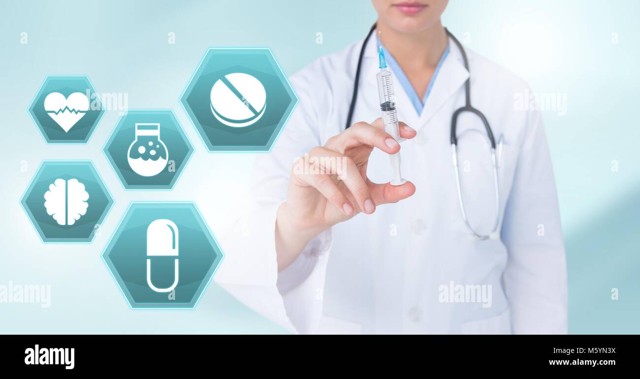 Doctor holding syringe avec médicaments médecine icônes dans l'interface à six pans Banque D'Images