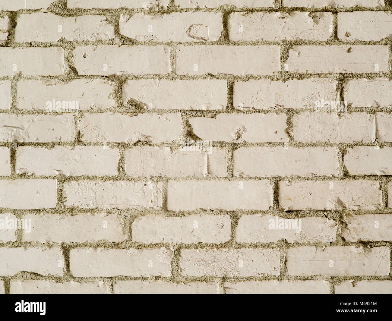 Mur de brique de style pays blanc photographie d'arrière-plan. Texture rugueuse briques peints en blanc dans un style ferme Banque D'Images