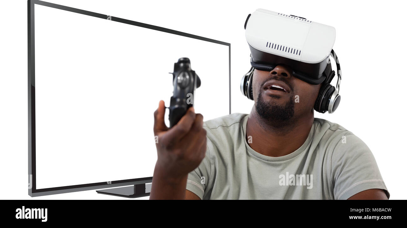 Image de l'homme composite à l'aide de casque de réalité virtuelle et jeux vidéos Banque D'Images