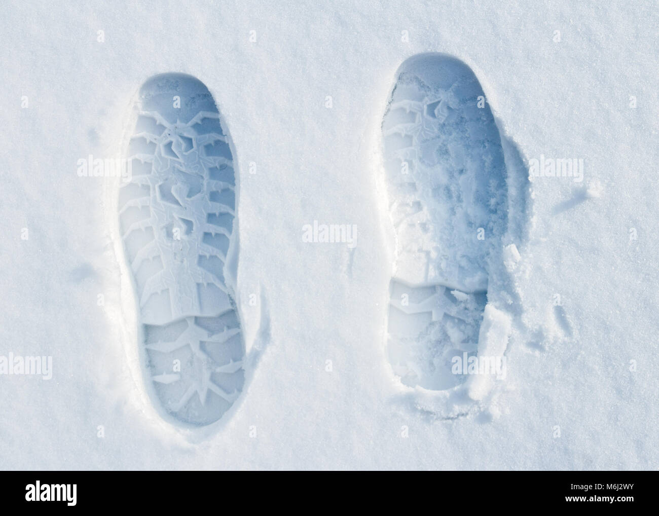Des empreintes de pas sur la neige Banque D'Images