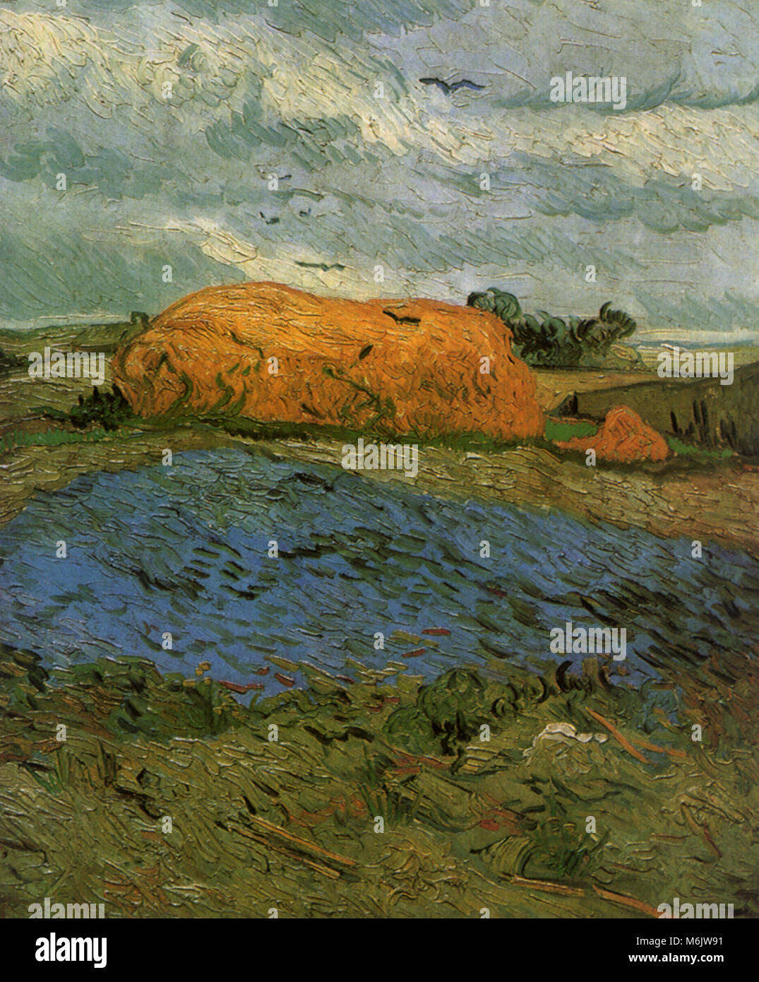 Meules sous un ciel pluvieux, Van Gogh, Vincent Willem, 1890. Banque D'Images