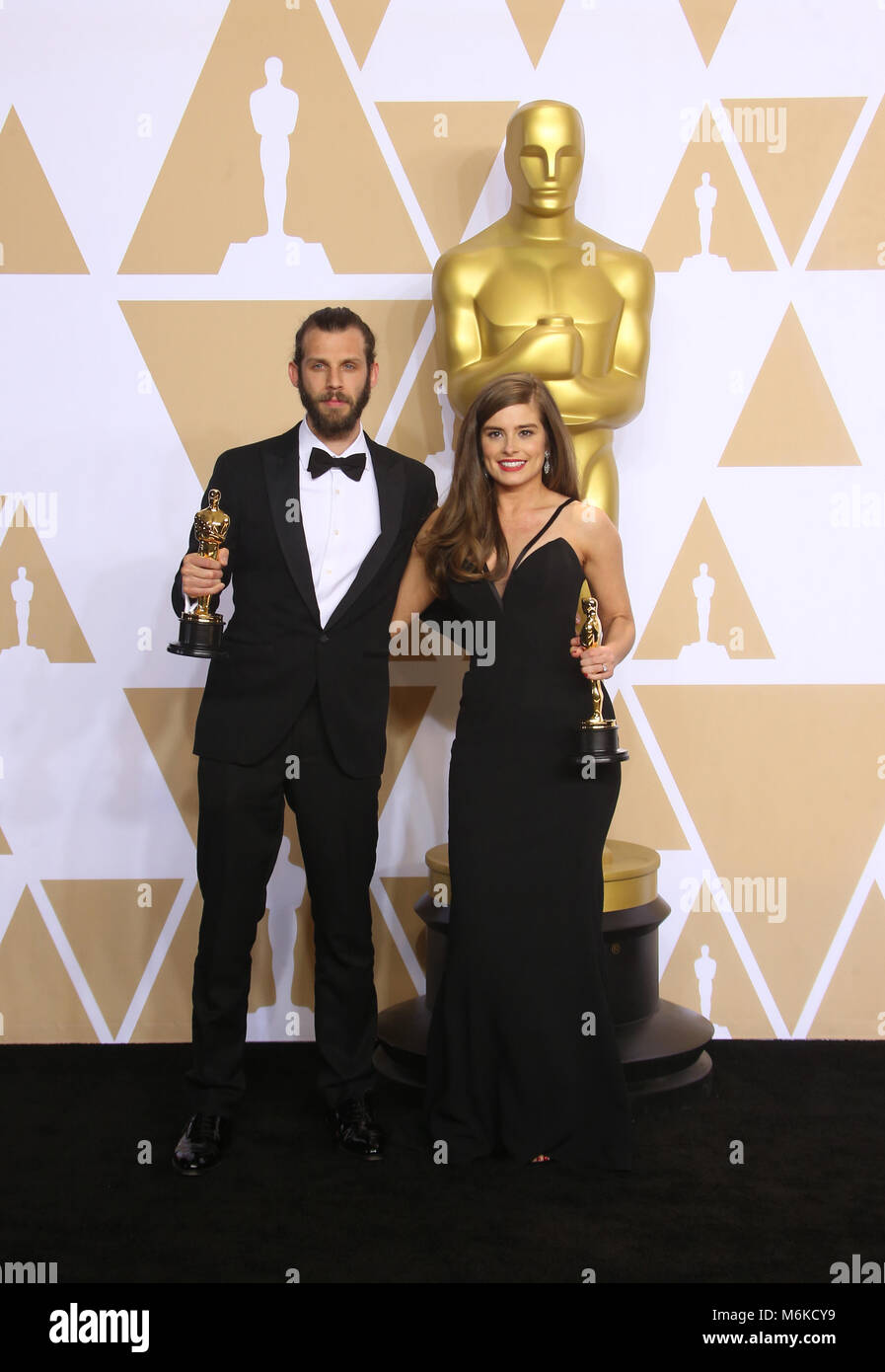 Hollywood, CA. 4e Mar, 2018. Chris Overton, Rachel Shenton, dans la salle de presse lors de la 90e Academy Awards au Kodak Theater à Hollywood, Californie le 4 mars 2018. Credit : MediaPunch Inc/Alamy Live News Banque D'Images