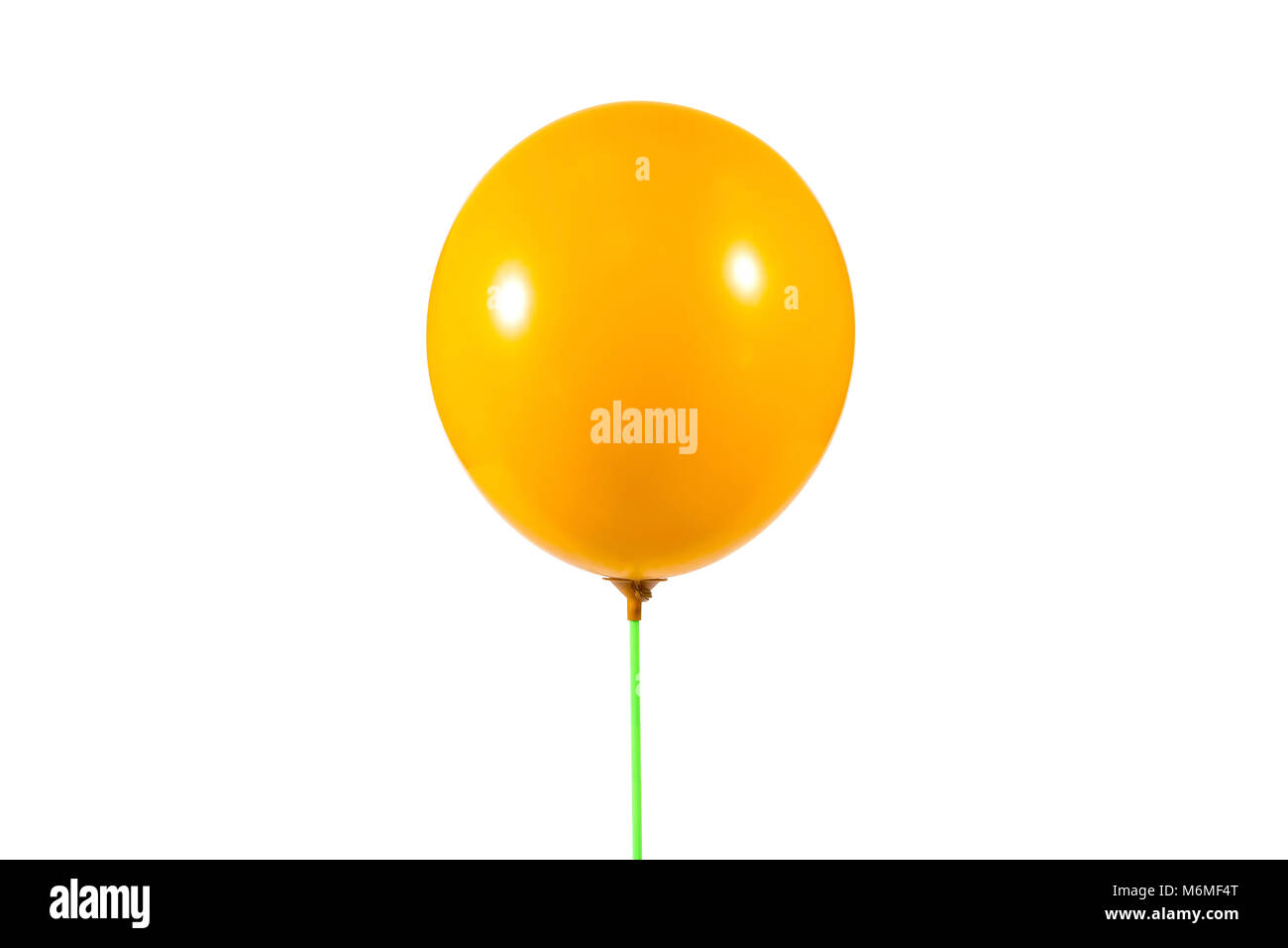 Ballon couleur jaune isolé sur fond blanc, utilisé pour la décoration lors de cérémonies ou d'événements importants. Banque D'Images