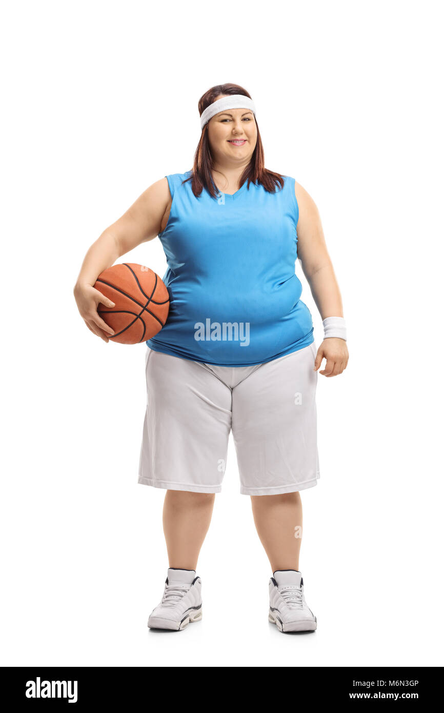 Portrait d'un excès de femme vêtue de la tenue d'un vêtement de basket-ball  isolé sur fond blanc Photo Stock - Alamy