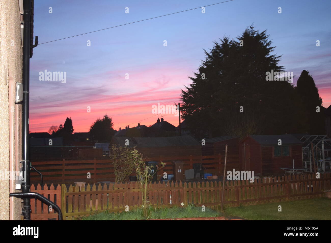 Rouge Red Skies' 'Scotland' Banque D'Images
