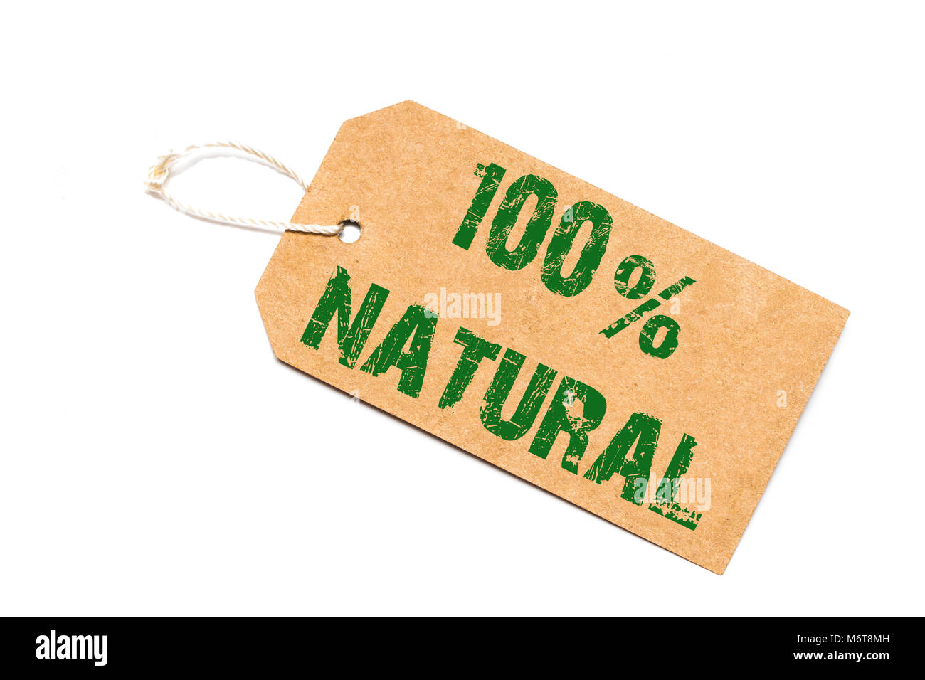 Cent pour cent signe naturel - un papier étiquette de prix sur un fond blanc - shopping concept. Banque D'Images