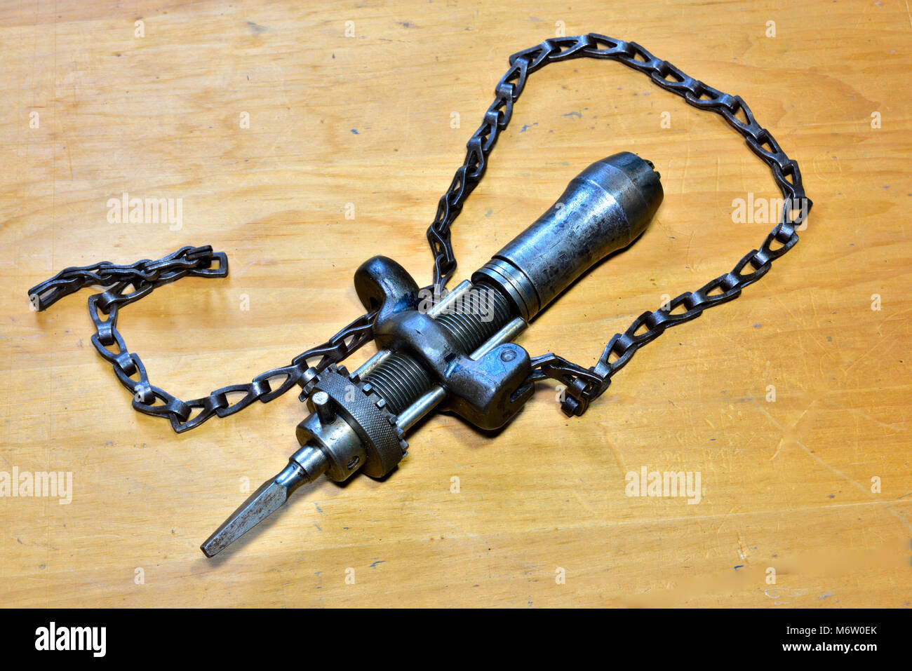 Société Goodall-Pratt la chaîne d'alimentation automatique mandrin d'entraînement qui pourrait être actionnés à la main par le renfort de forage. Serait la chaîne enroulée autour d'élément à dri Banque D'Images