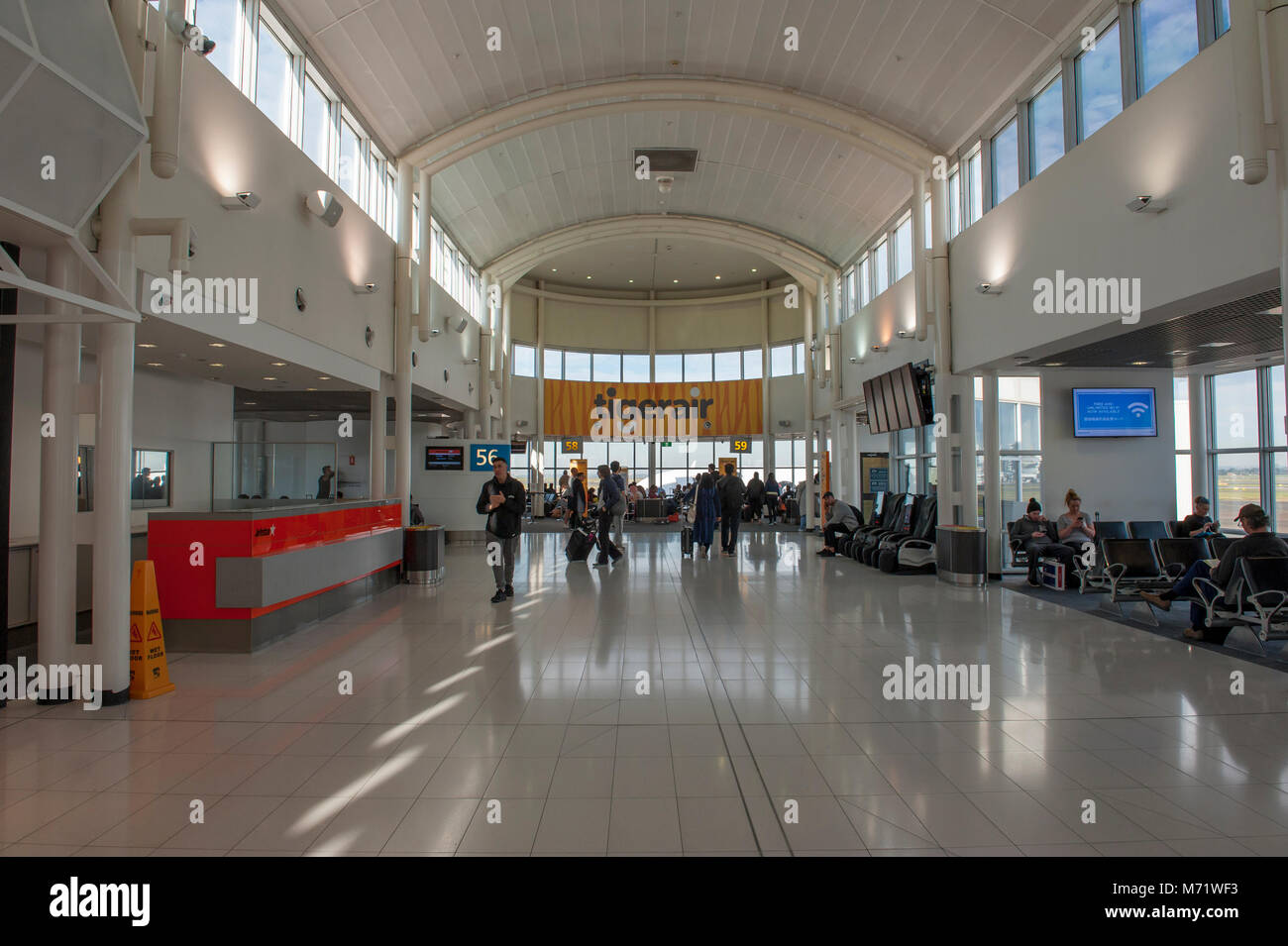 Signe de l'aéroport de Tiger Airways à l'aéroport de Sydney. Porte de départ. Mascot. L'AUSTRALIE Banque D'Images
