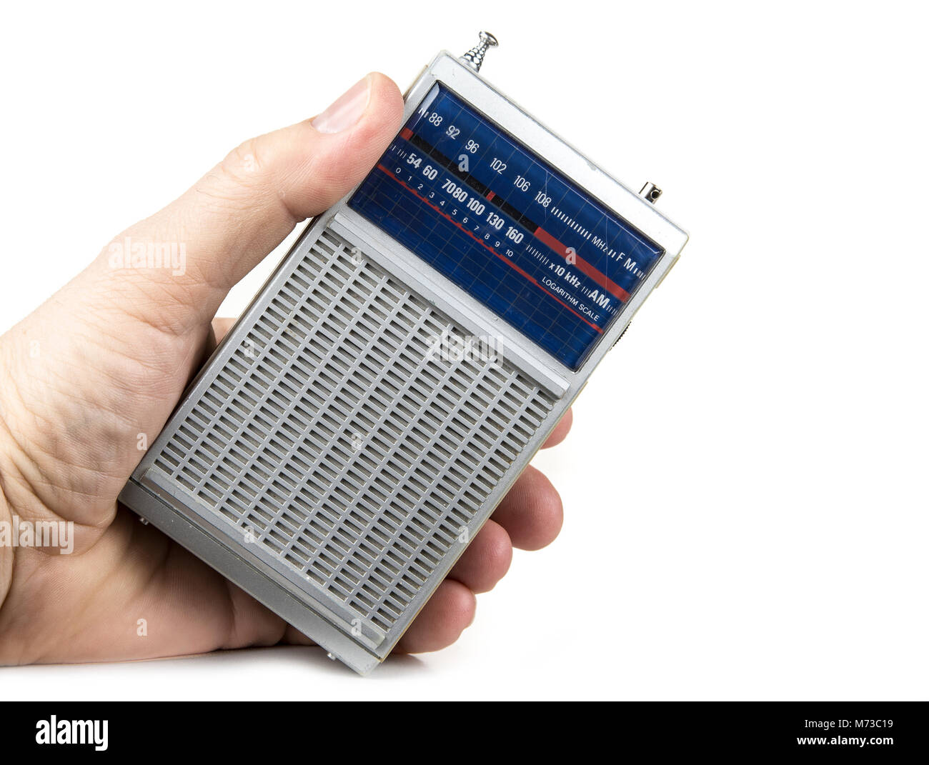 Ancien et petit transistor radio sur le livre blanc sur la batterie Photo  Stock - Alamy
