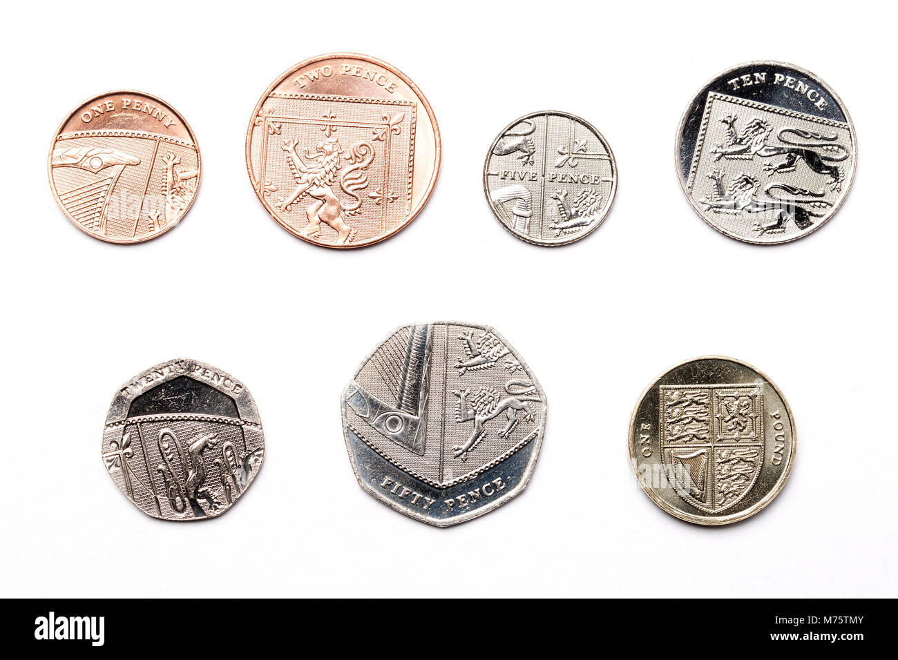 La monnaie sur un fond blanc Banque D'Images