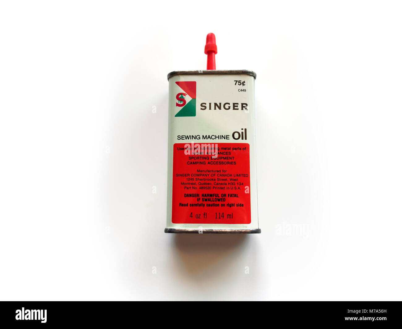 Huile pour machine à coudre Singer Banque D'Images