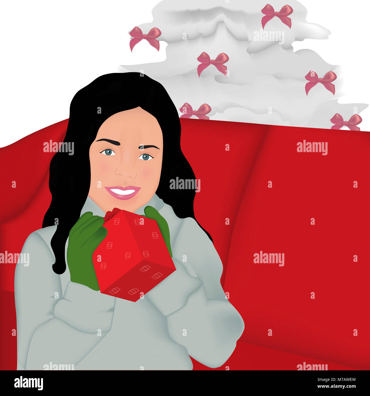 Portrait of a Girl sitting on a couch holding a Christmas present Banque D'Images