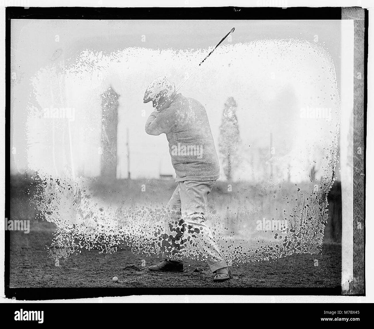 Un portrait de A. Mitchell Palmer, mettant en valeur ses talents de golfeur dans un contexte de compétition, contribuant à sa réputation dans le sport. Banque D'Images