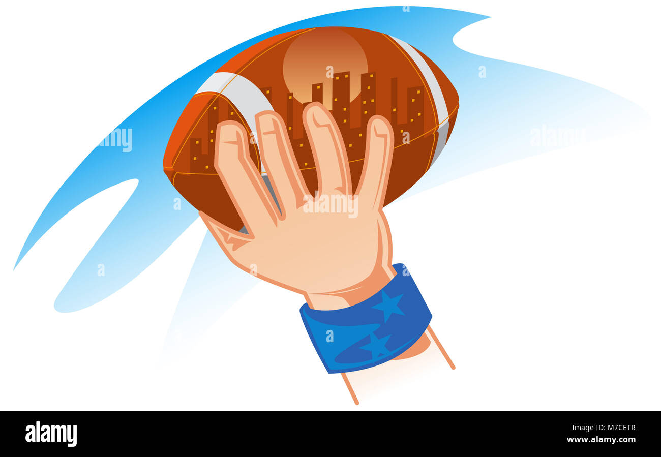 Close-up of a person's hand holding un ballon de rugby Banque D'Images