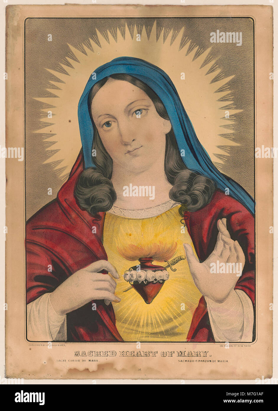 L'image montre une représentation du Sacré-cœur de Marie, symbole chrétien emblématique représentant l'amour maternel et la compassion de la Vierge Marie. La représentation est montrée en plusieurs langues : français ('Sacré coeur de Marie') et espagnol ('Sagrado Corazón de María'). Banque D'Images