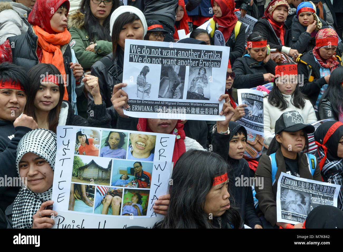 La justice pour les travailleurs migrants Erwiana Protestation de Hong Kong. Les travailleurs domestiques étrangers à Hong Kong dans la rue marchant au siège du gouvernement Banque D'Images