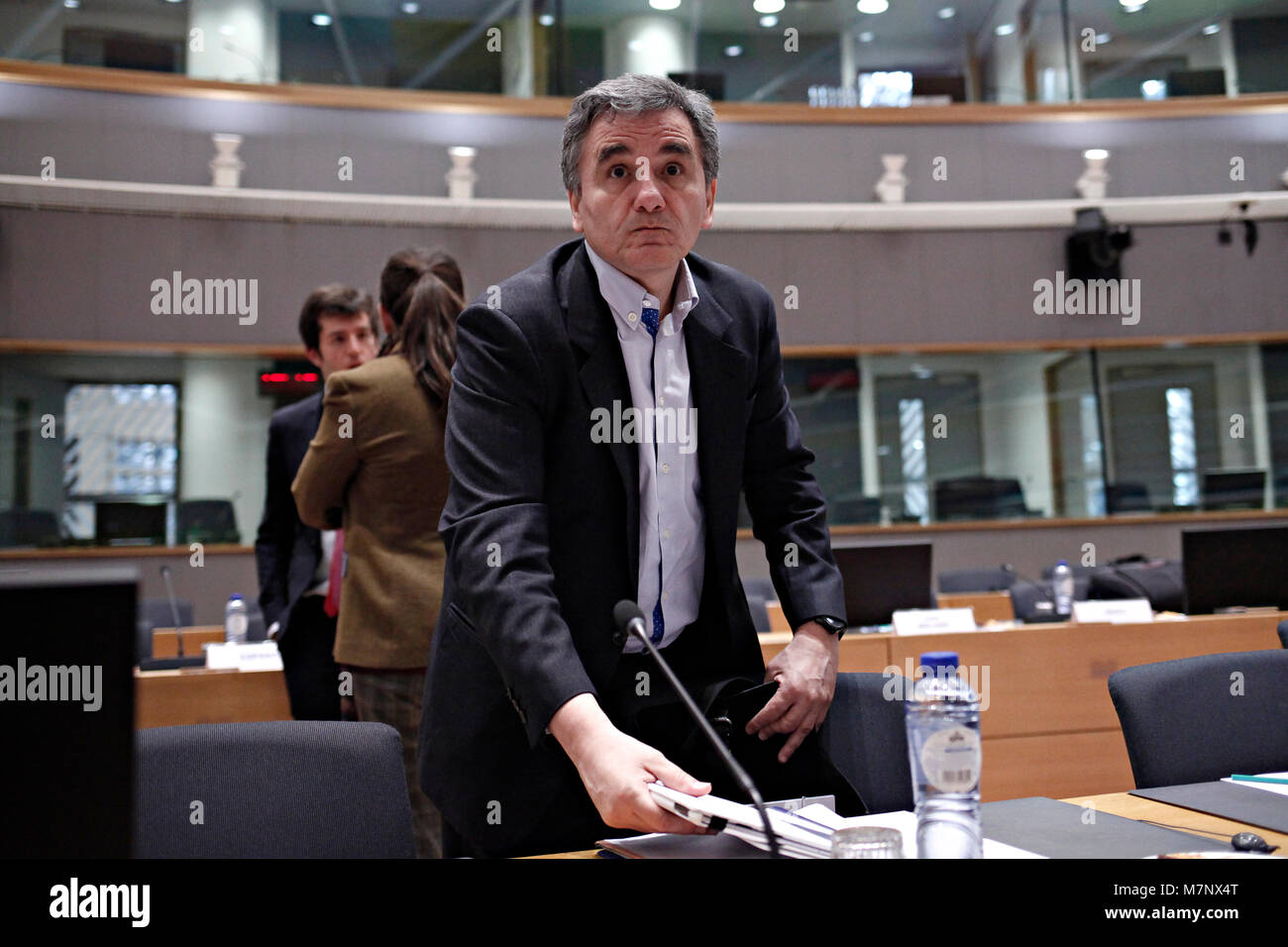 Bruxelles, Belgique. 12 mars, 2018. Le ministre grec des Finances d'Euclid Tsakalotos au sein de l'eurogroupe à l'immeuble du Conseil de l'UE à Bruxelles le lundi 12 mars 2018. Alexandros Michailidis/Alamy Live News Banque D'Images