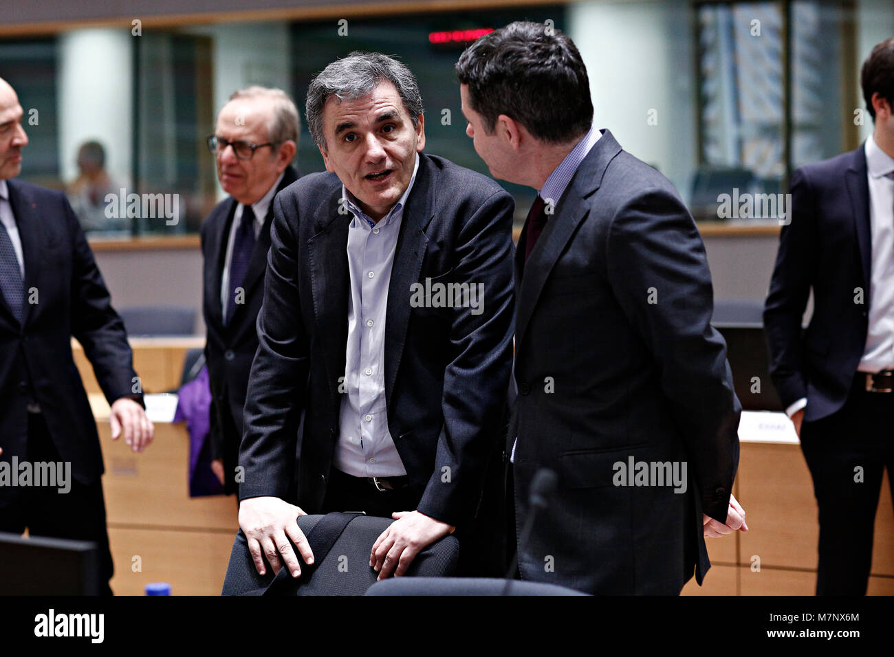 Bruxelles, Belgique. 12 mars, 2018. Le ministre grec des Finances d'Euclid Tsakalotos au sein de l'eurogroupe à l'immeuble du Conseil de l'UE à Bruxelles le lundi 12 mars 2018. Alexandros Michailidis/Alamy Live News Banque D'Images