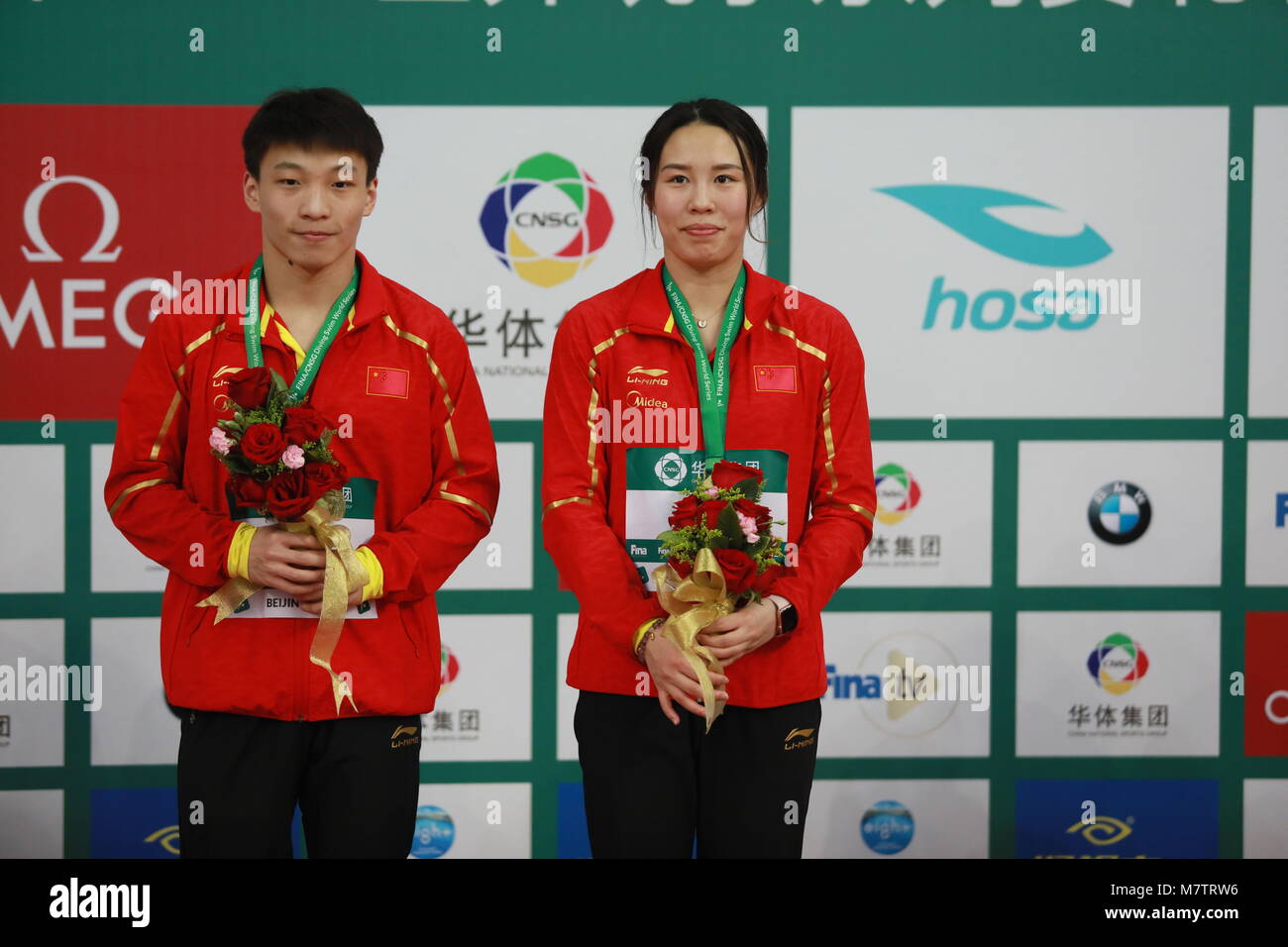 10 mars 2018 - Pékin, Beijing, Chine - Pékin, Chine 10e Mars 2018 : les plongeurs chinois Wang Li Zheng Han et gagner la médaille d'or du plongeon synchronisé mixte 3m à la série mondiale FINA de Plongeon à Pékin, le 10 mars 2018. (Crédit Image : © SIPA l'Asie via Zuma sur le fil) Banque D'Images