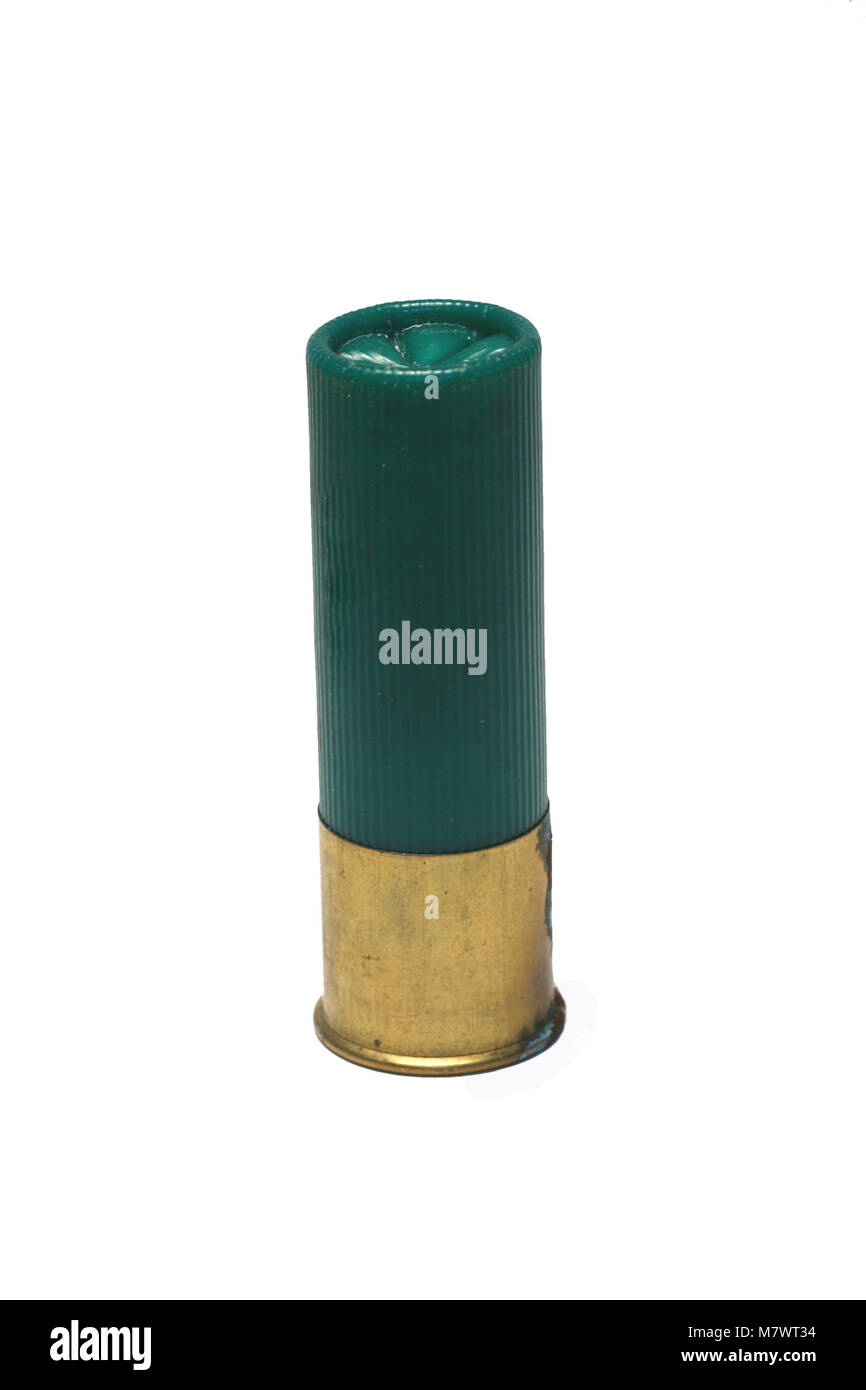 Un Isolaged 12 green gage shotgun shell Banque D'Images