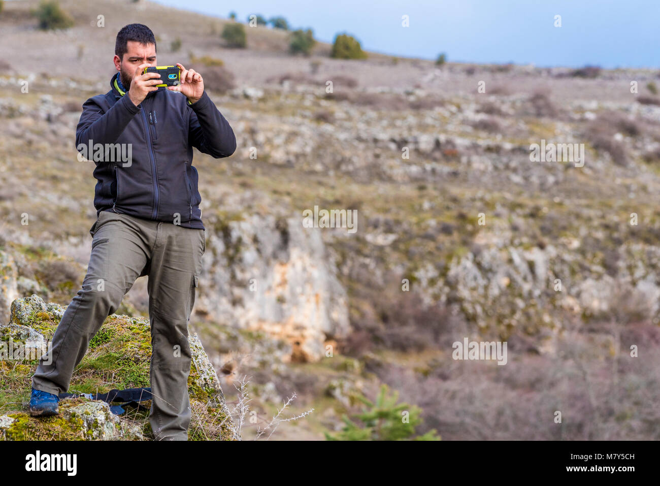 Fotografiando Autorretrato con el movil Banque D'Images