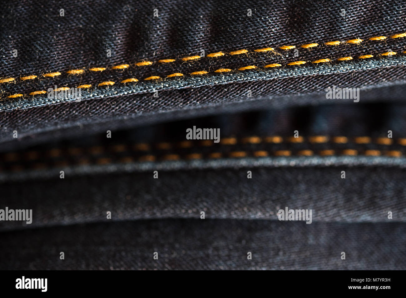 De gros plan de texture Denim denim Jeans et croix pour vintage Banque D'Images