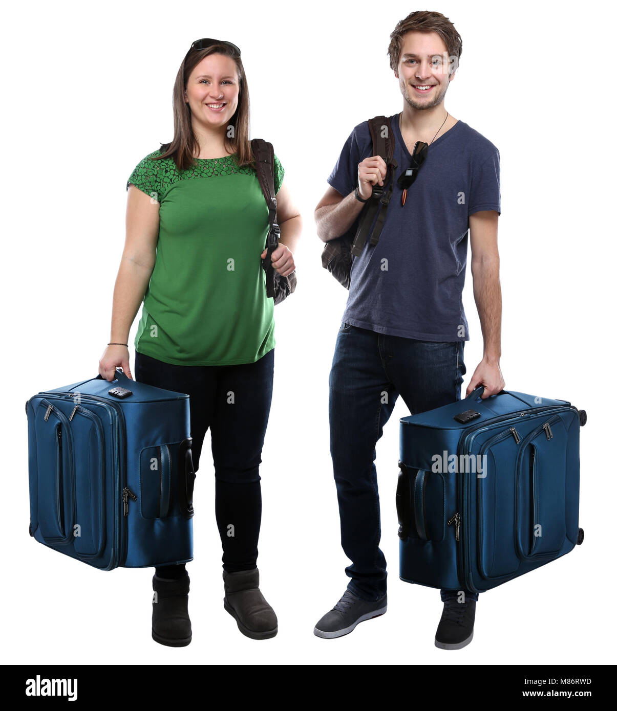 Les jeunes personnes avec bagages voyager locations de vacances smiling isolé sur fond blanc Banque D'Images