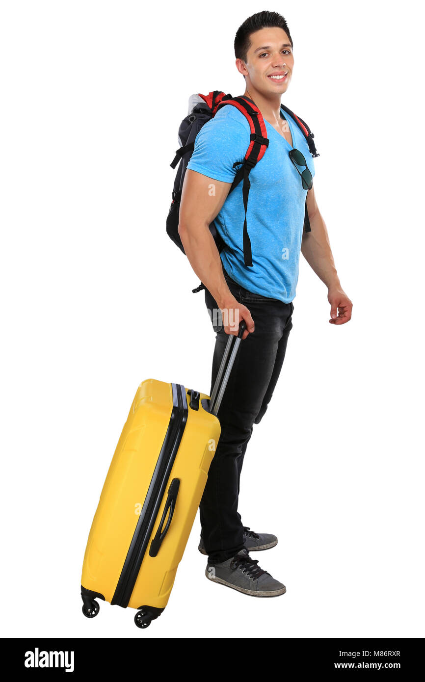 Jeune homme sac voyage bagages tirant locations de vacances smiling isolé sur fond blanc Banque D'Images