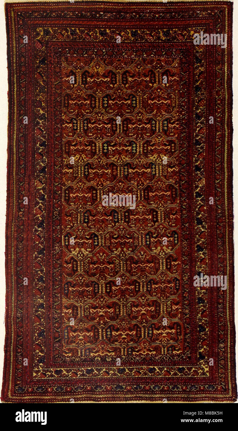 Un ouvrage allemand de 1917 sur l'histoire, l'artisanat et le commerce des tapis orientaux, explorant leur importance culturelle et leur développement. Banque D'Images