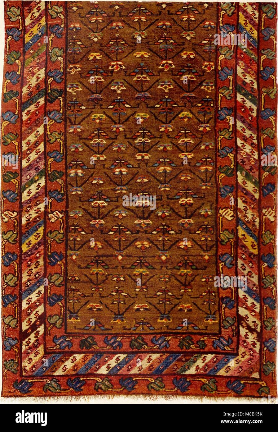'Der Orient-Teppich' (1917) explore l'histoire, l'artisanat et le commerce des tapis orientaux, en se concentrant sur leur signification culturelle et leur impact sur l'art et le commerce. Banque D'Images