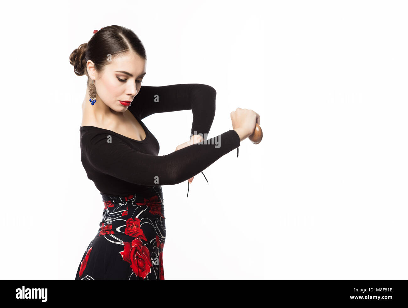 Danseuse de flamenco sur un fond clair. L'espace libre pour votre texte Banque D'Images