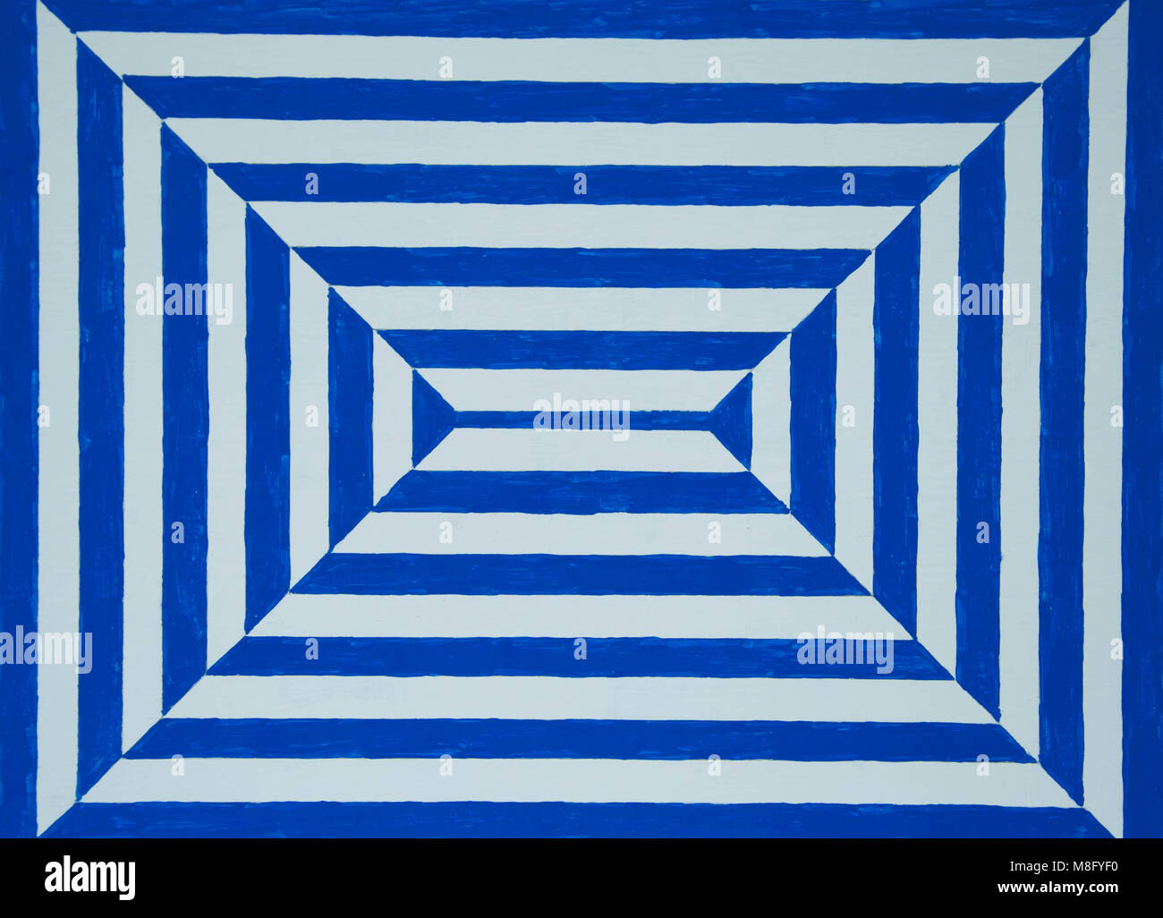 La main peinte en bleu et blanc illusion optique Banque D'Images