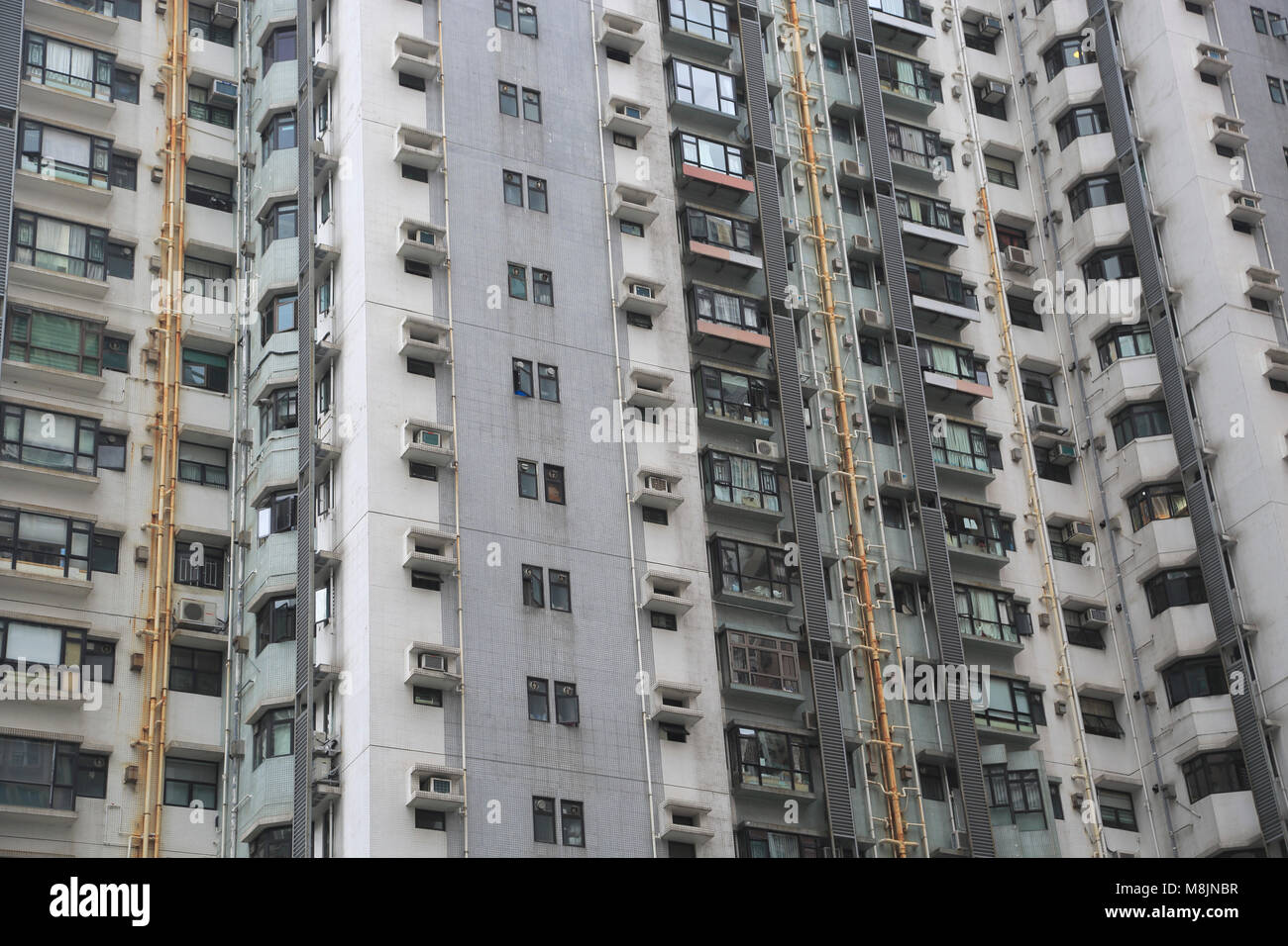 Les tours d'immeuble d'appartements de moyenne, l'île de Hong Kong, Hong Kong, Chine, Asie Banque D'Images