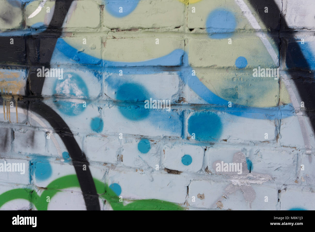 Street art graffiti sur le mur tag symbole de course Banque D'Images