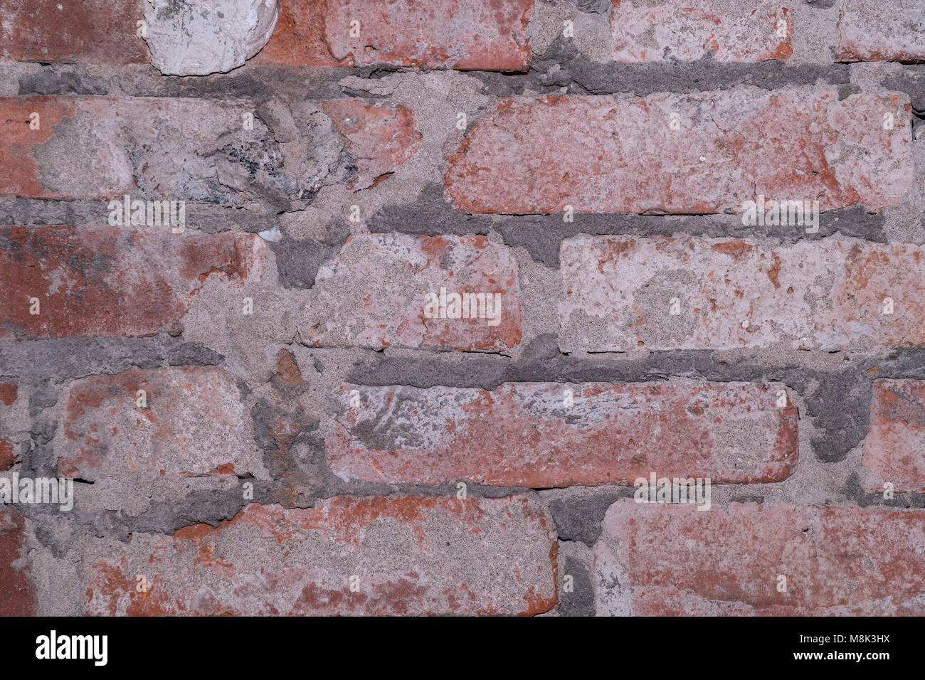 Fragment d'un vieux mur de brique rouge texture background Banque D'Images