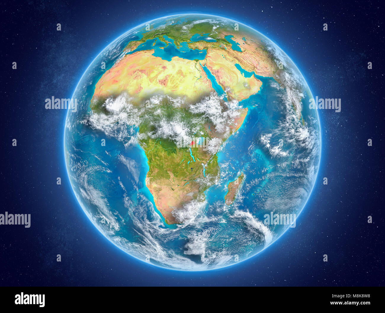 Le Rwanda en rouge sur le modèle de la planète Terre avec des nuages et l'atmosphère dans l'espace. 3D illustration. Éléments de cette image fournie par la NASA. Banque D'Images