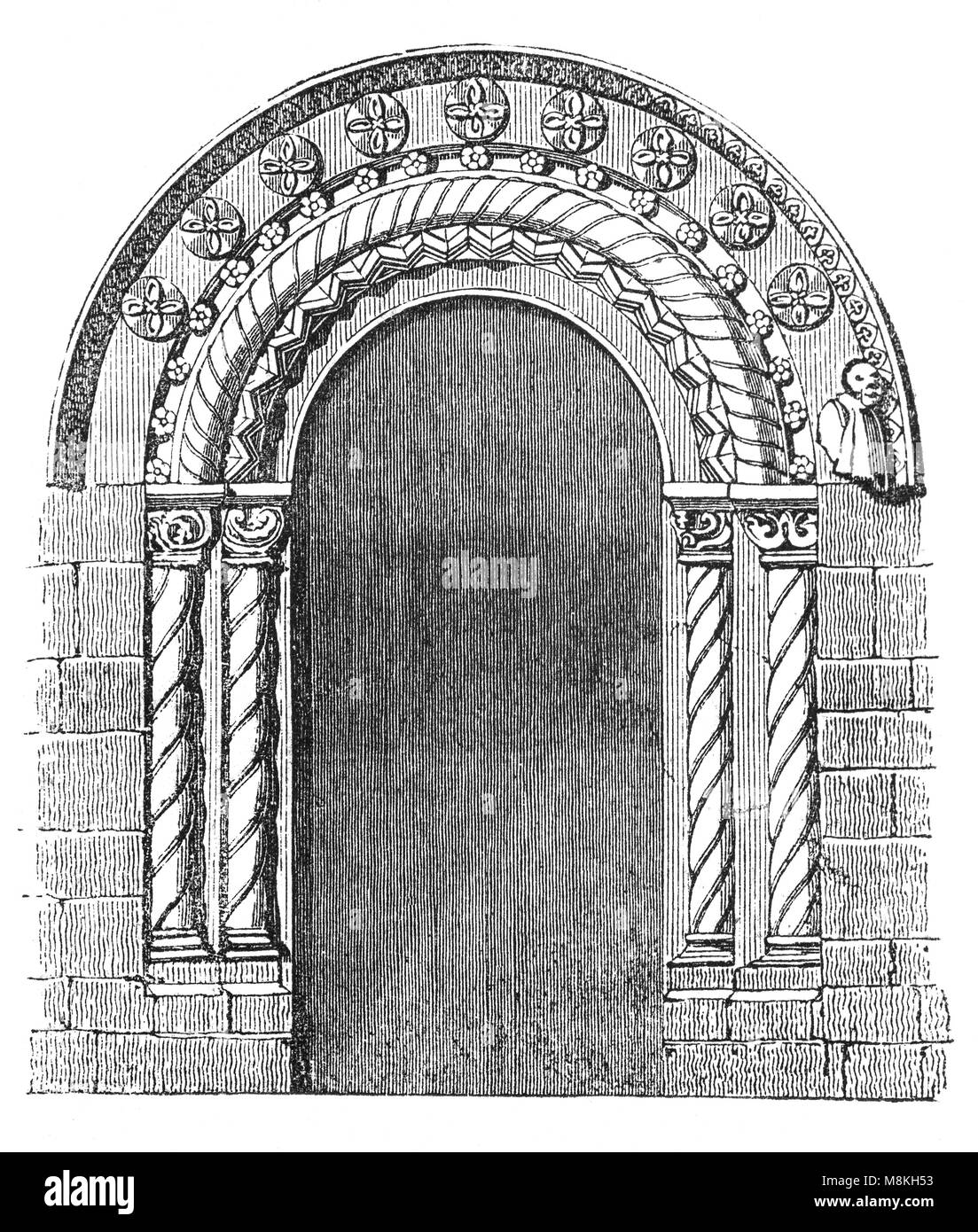 La porte romane de l'abbaye de Romsey, une église paroissiale de l'Église d'Angleterre en Romsey, une ville de marché dans le Hampshire, en Angleterre. L'église a été construite au cours du 10e siècle, dans le cadre d'une fondation Bénédictine. Il a finalement été supprimé par Henry VIII lors de la dissolution des monastères en 1539, cependant l'abbaye n'a pas subi le sort de nombreux autres établissements religieux à cette époque et n'a pas démoli. Banque D'Images