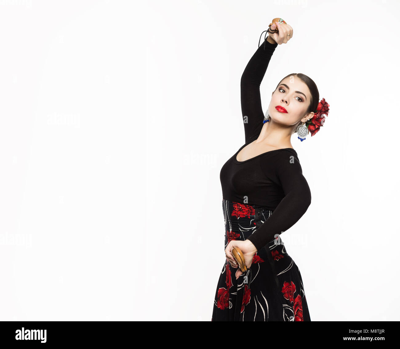 Jeune fille espagnole flamenco dancer sur un fond clair. L'espace libre pour votre texte Banque D'Images