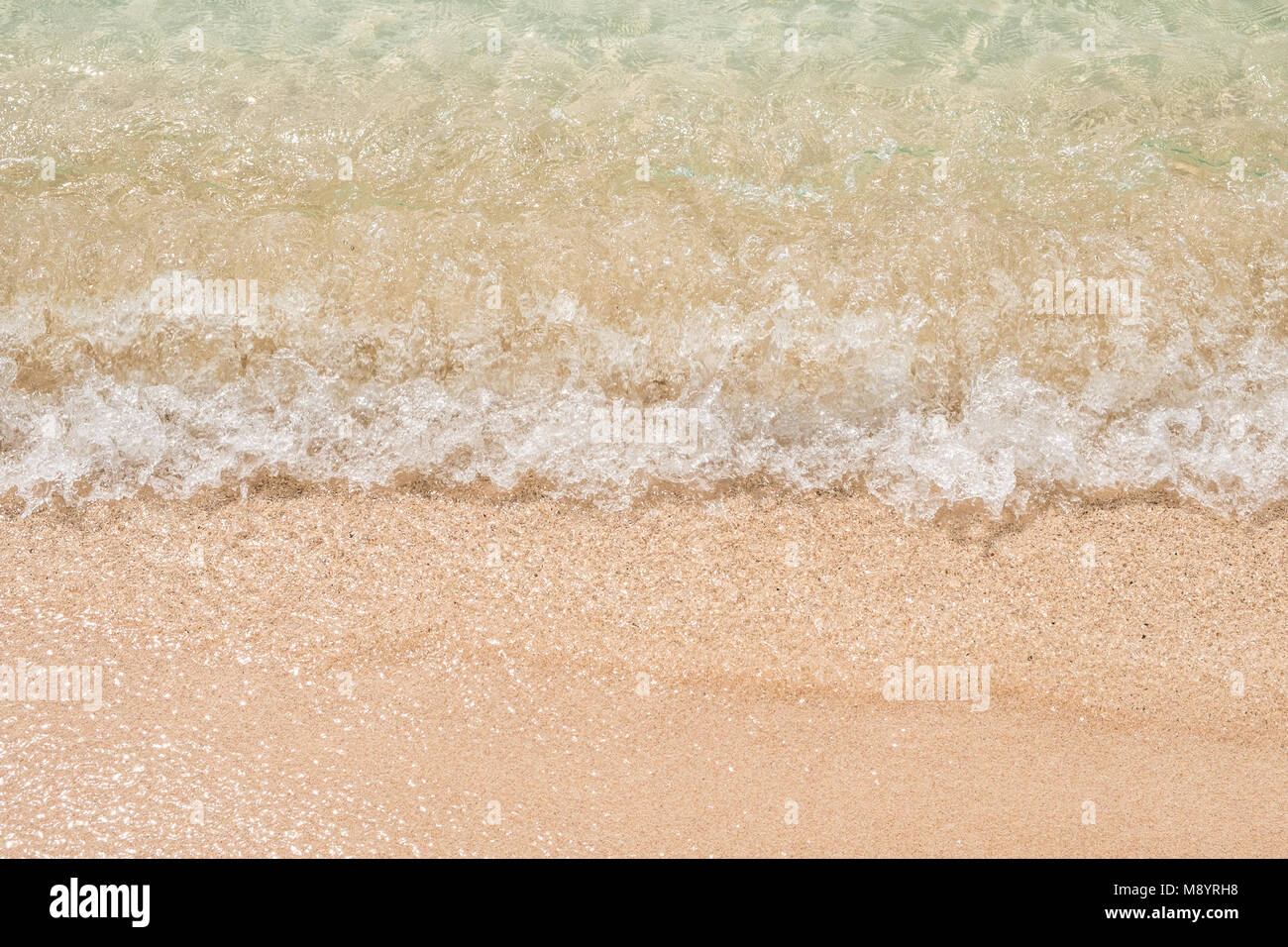 Eau macro , plage de sable blanc propre closeup Banque D'Images