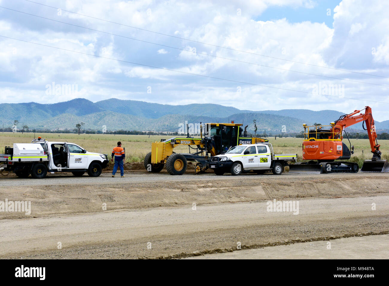 Travaux de voirie QUEENSLAND, HITACHI DIGGER, JOHN DEER GRADER Banque D'Images