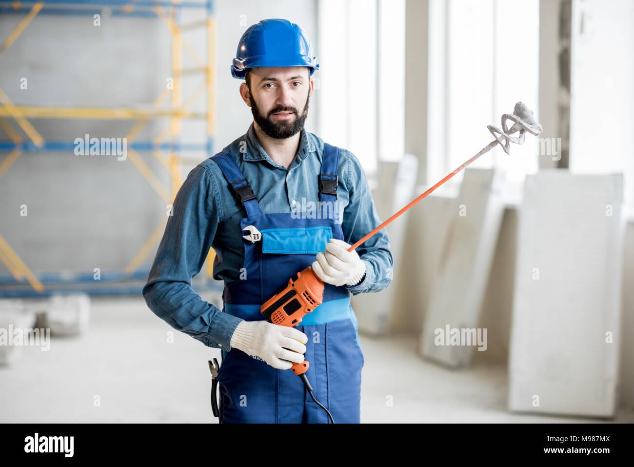 Builder avec la perceuse Banque D'Images