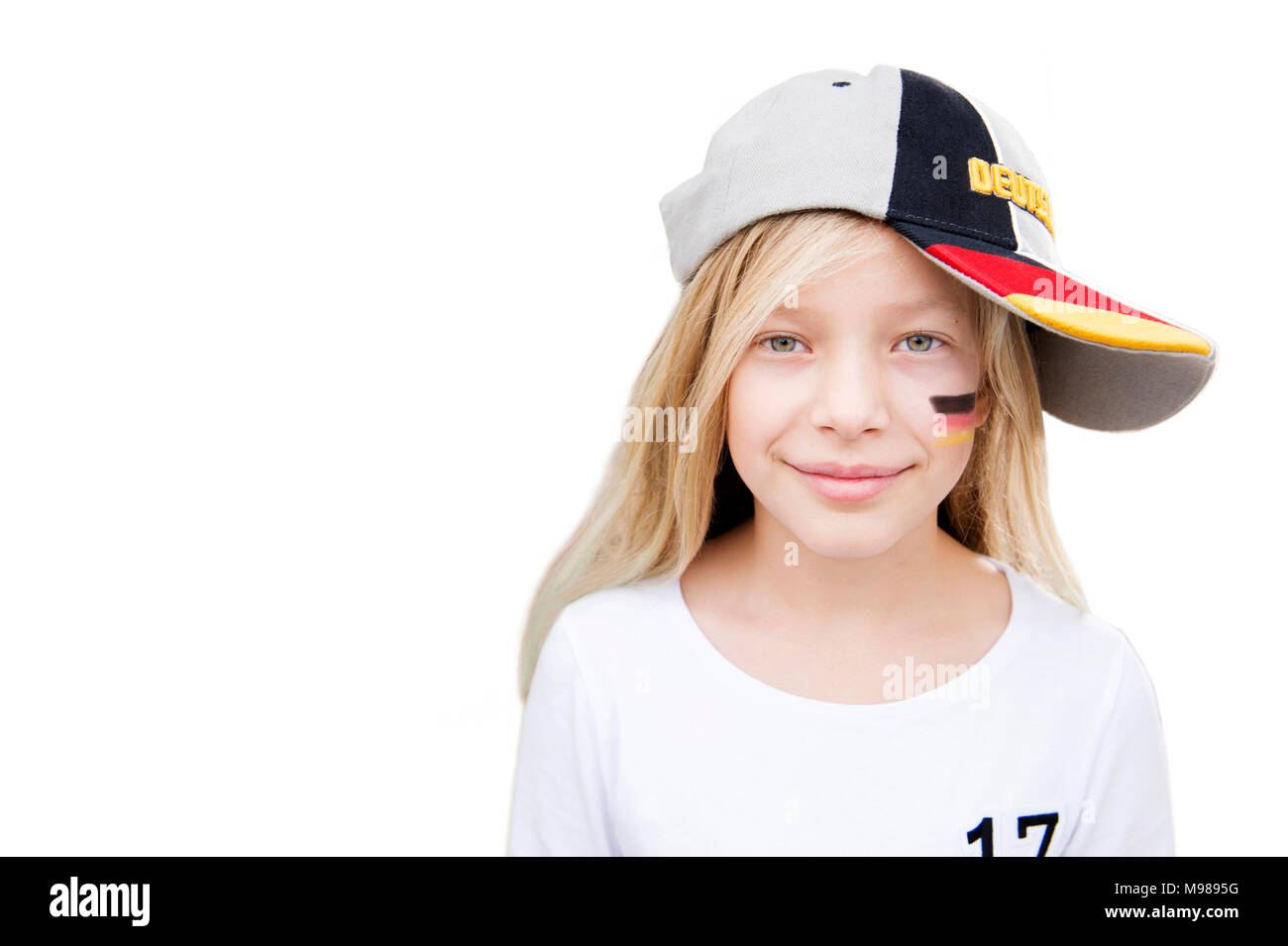 Portrait d'une fille avec de la peinture pour le visage et le chapeau allemand Banque D'Images
