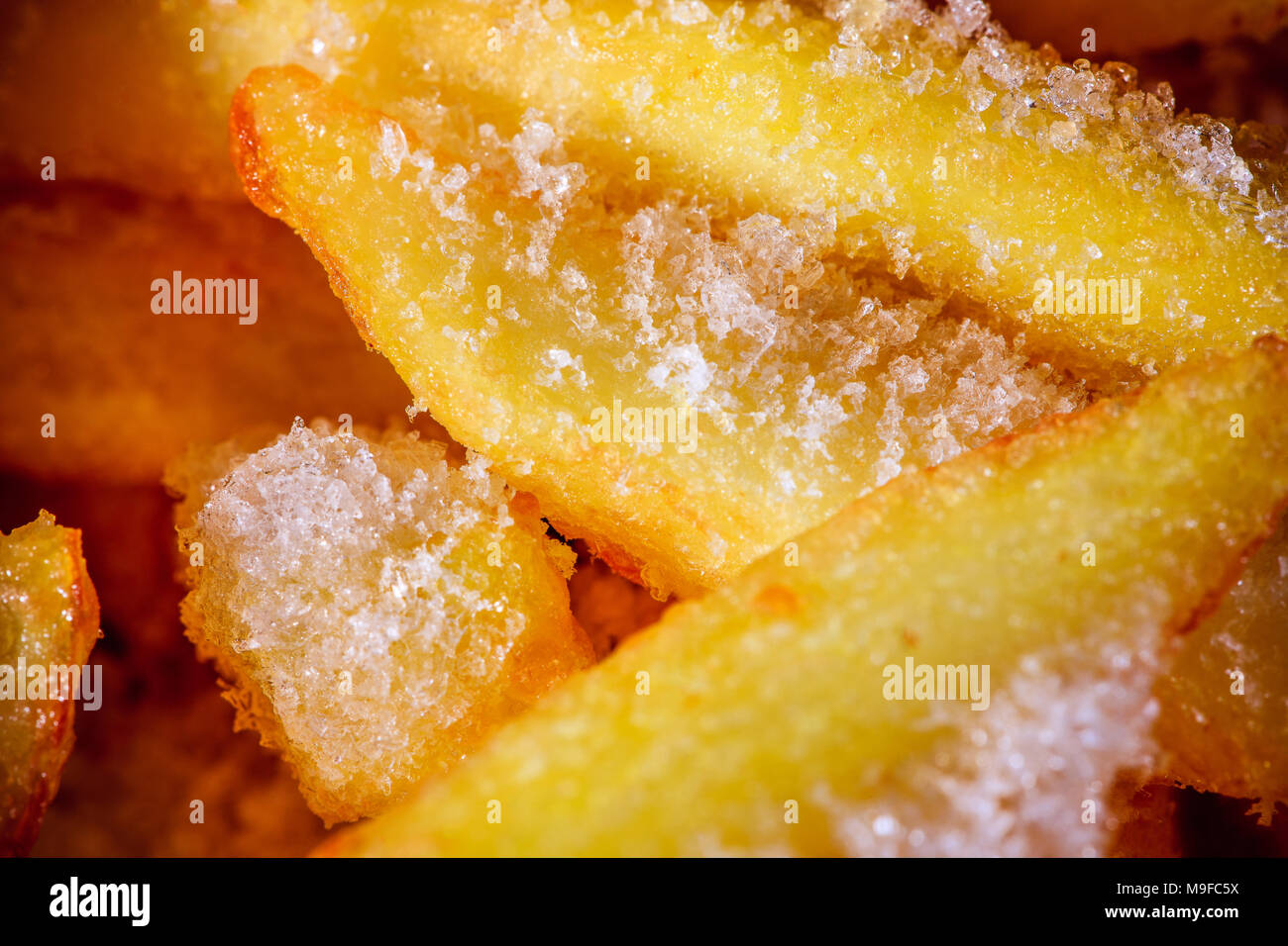 Les frites surgelées, close-up, le sel, la glace fond texturé, Banque D'Images