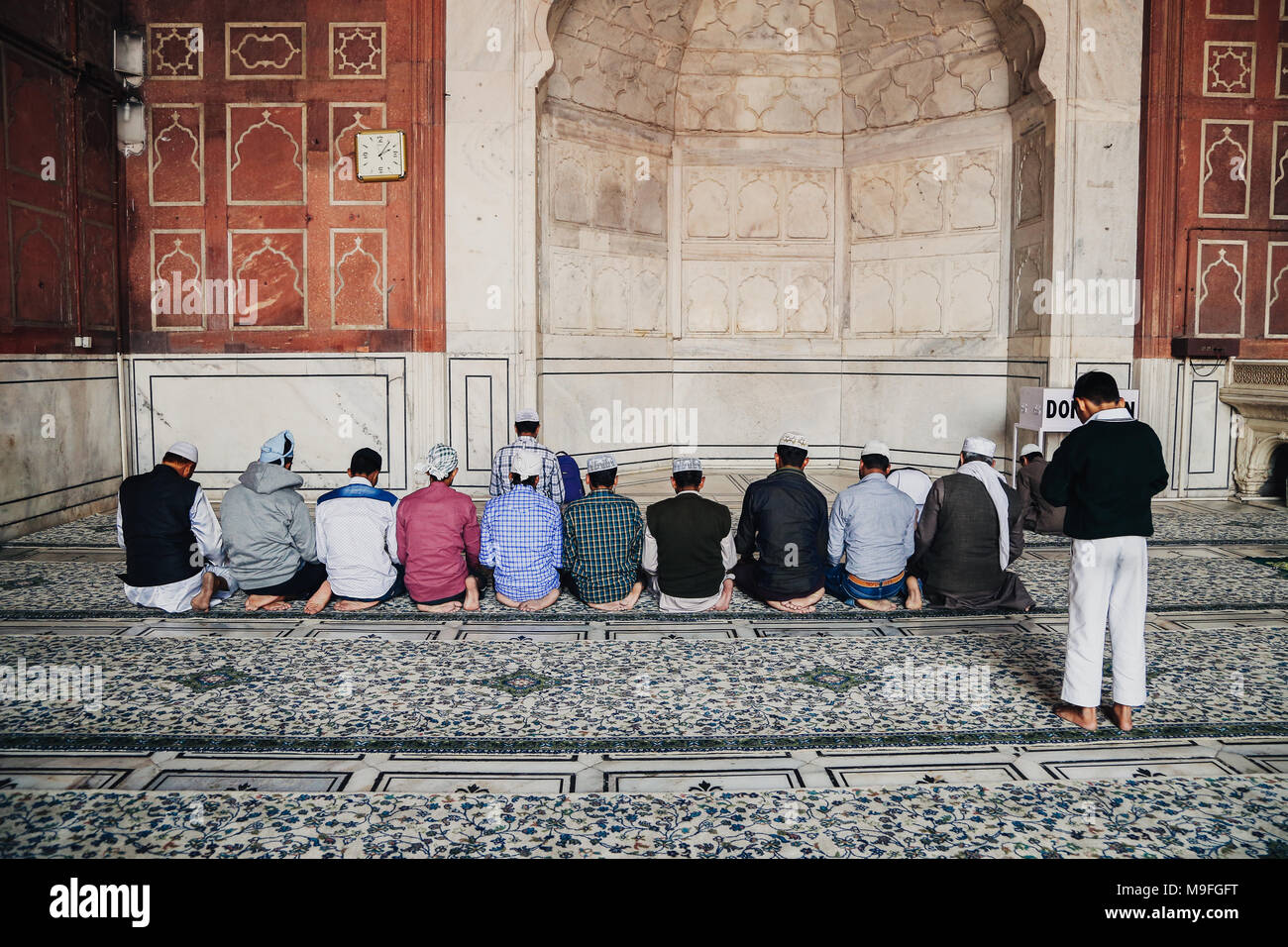 Population musulmane dans le Jama Masjid, Delhi, Inde Banque D'Images
