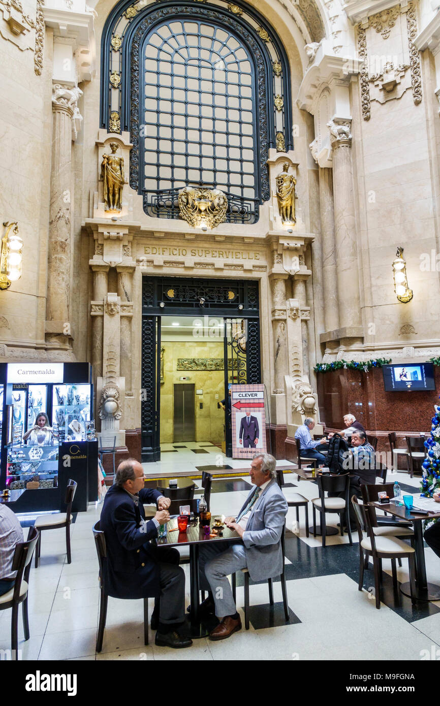 Buenos Aires Argentine,Florida Street,Galeria Guemes,galerie commerciale, café,table,intérieur,homme d'affaires,homme hommes,hispanique,ARG17112 Banque D'Images