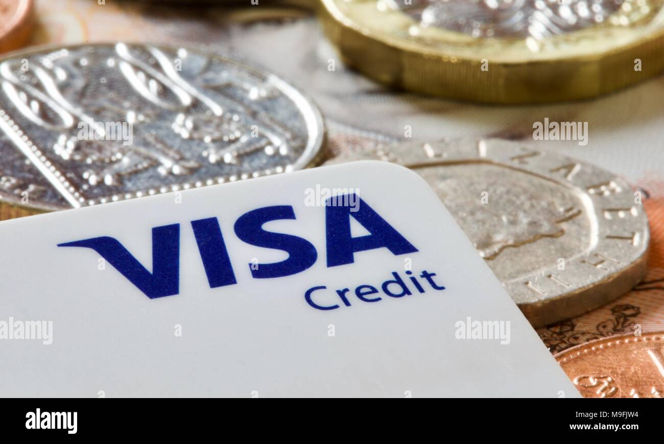 Carte de crédit Visa et les pièces à l'arrière-plan Banque D'Images