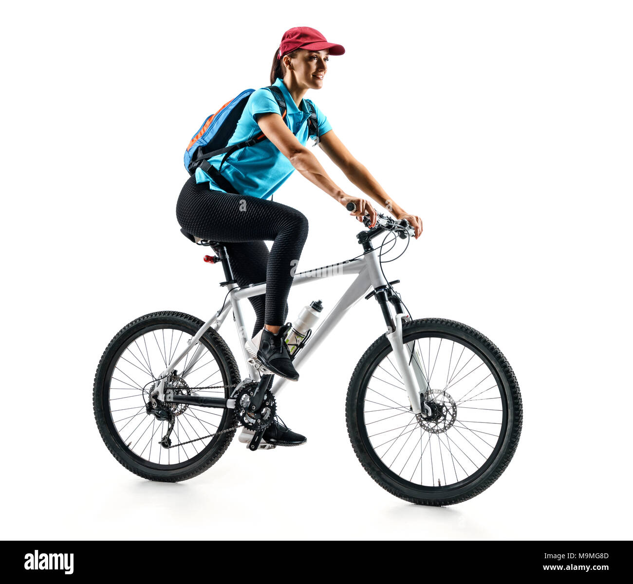Cycliste de tee-shirt bleu avec le vélo en silhouette sur fond blanc. Sport et mode de vie sain Banque D'Images