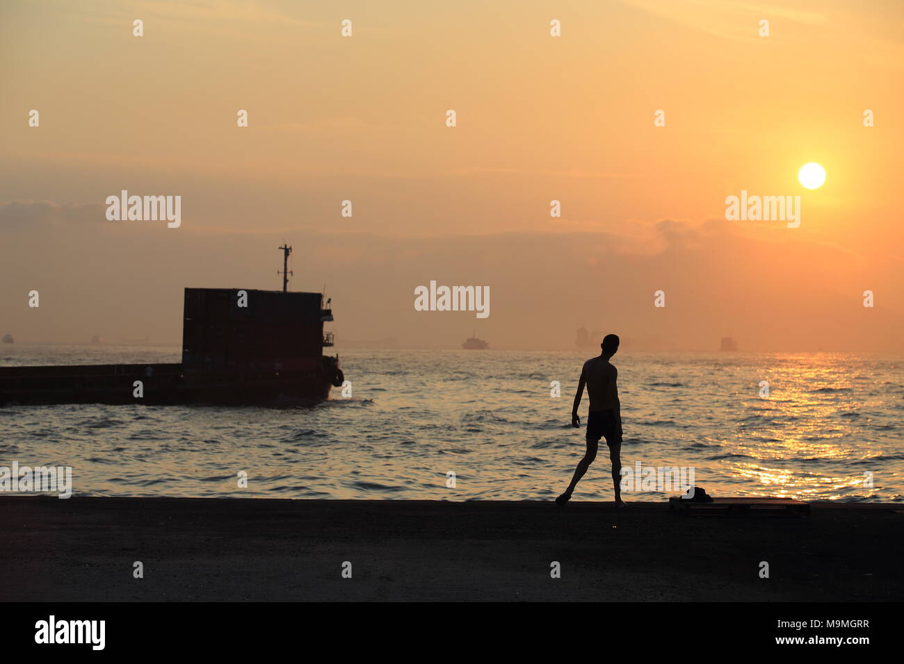 Se lever et de crier au soleil à Hongkong Banque D'Images