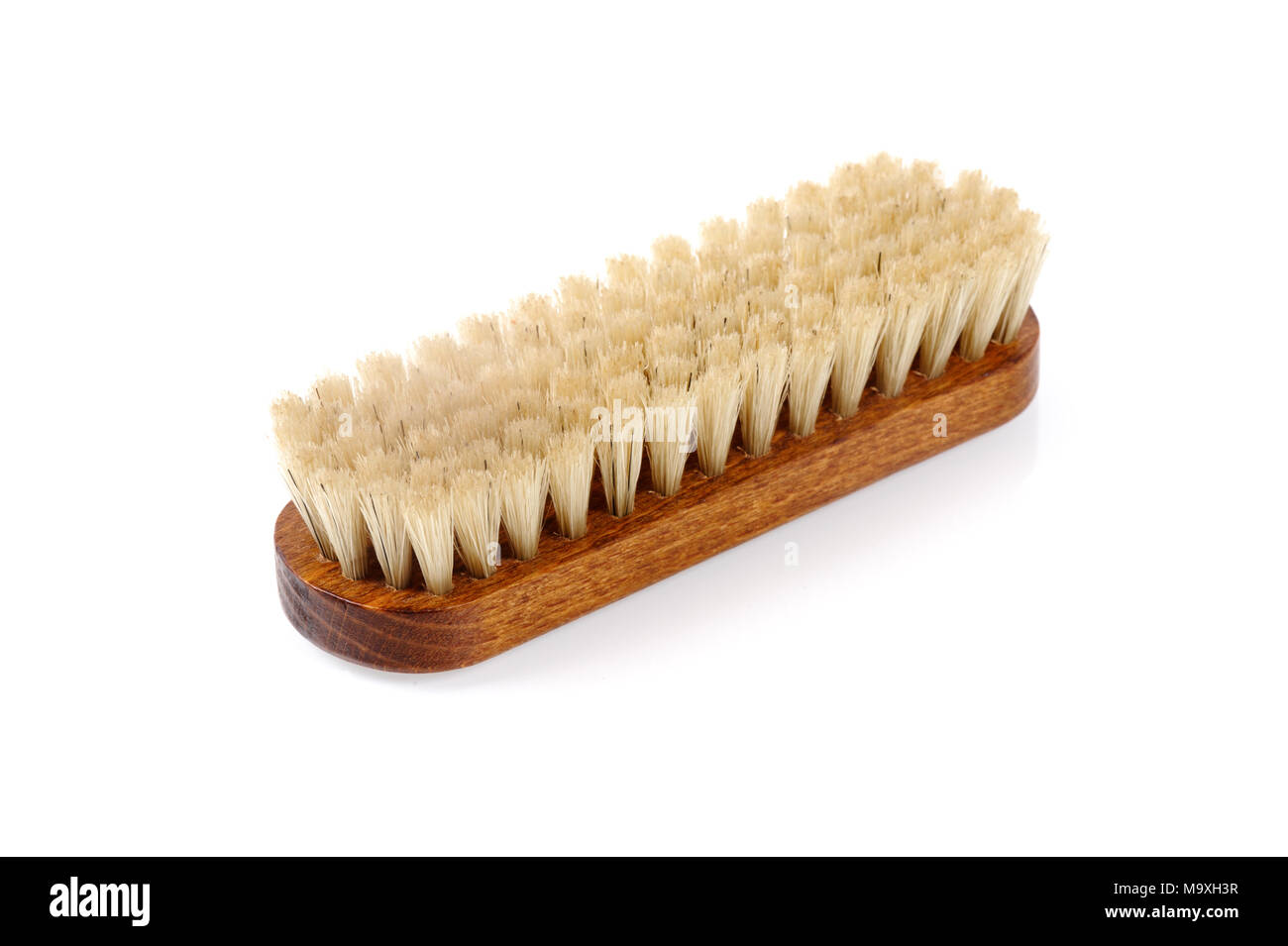 Brosse crin isolé sur fond blanc, le crin brosse pour polir des chaussures en cuir. Banque D'Images