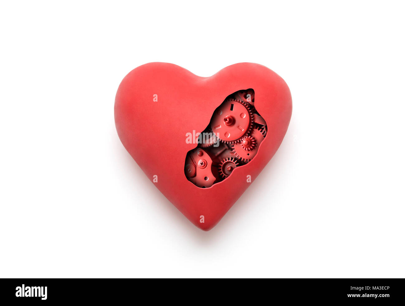 Coeur mécanique rouge sur fond blanc avec clipping path Banque D'Images